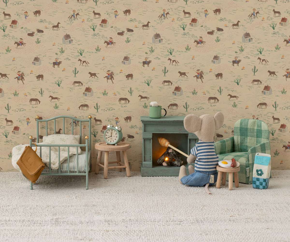 Maileg SS25 Collection featuring the new louimax mouse, bed, armchair, and fireplace, set against a whimsical Western-themed wallpaper. Perfect for imaginative play! #Maileg #MouseinaBox #SS25 #Dollhouse #ToyPhotography