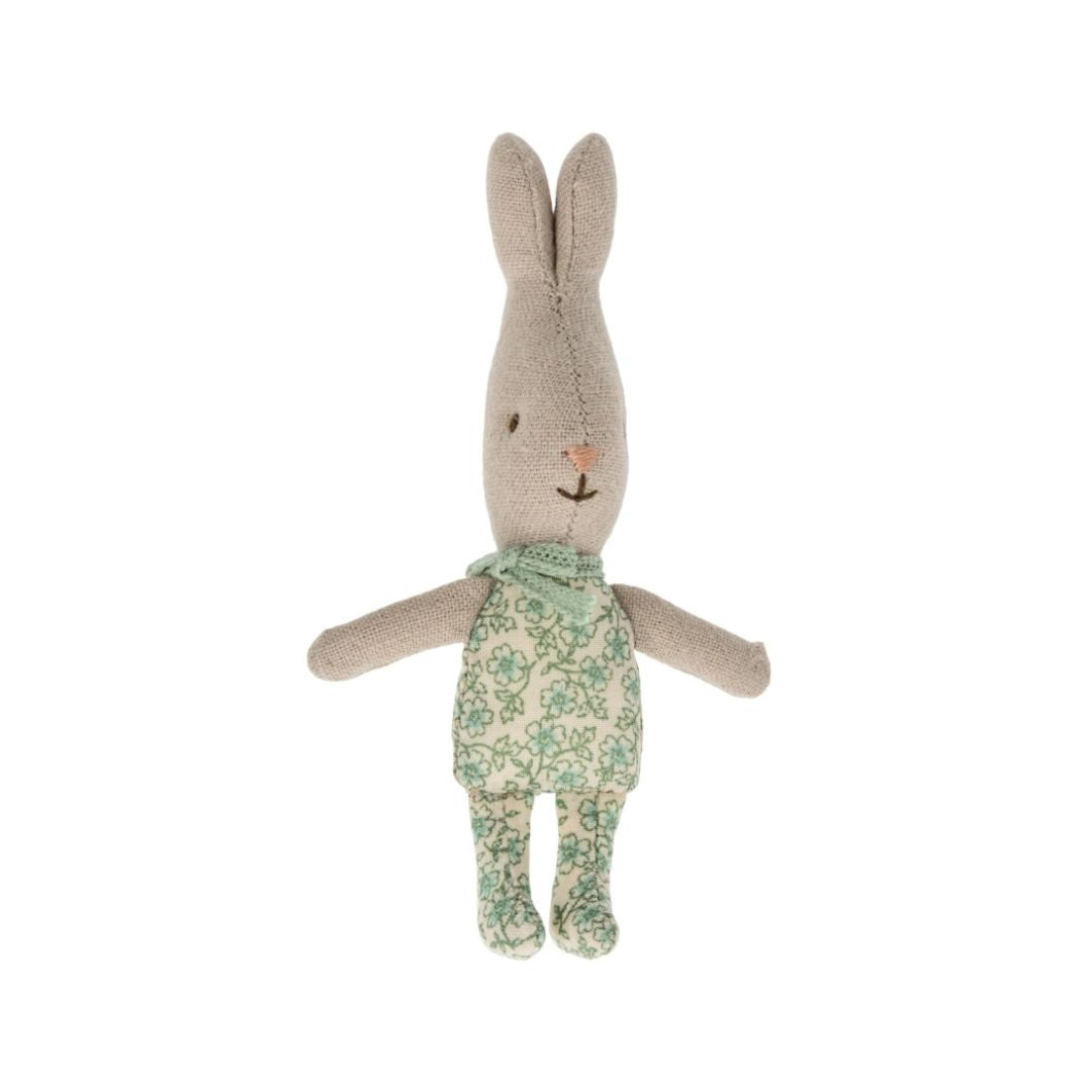 Maileg teeny tiny bunny wearing a green flowery outfit 